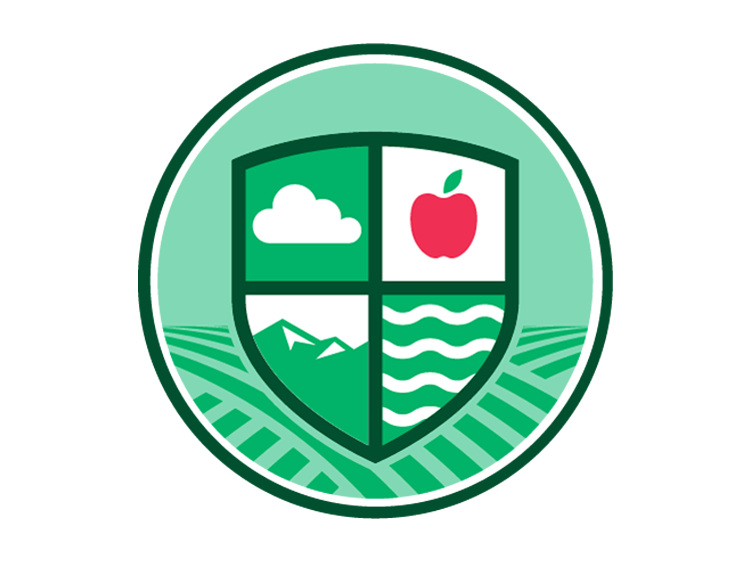 Environmental Health Division icon depicting clouds, mountains, and water in a shield